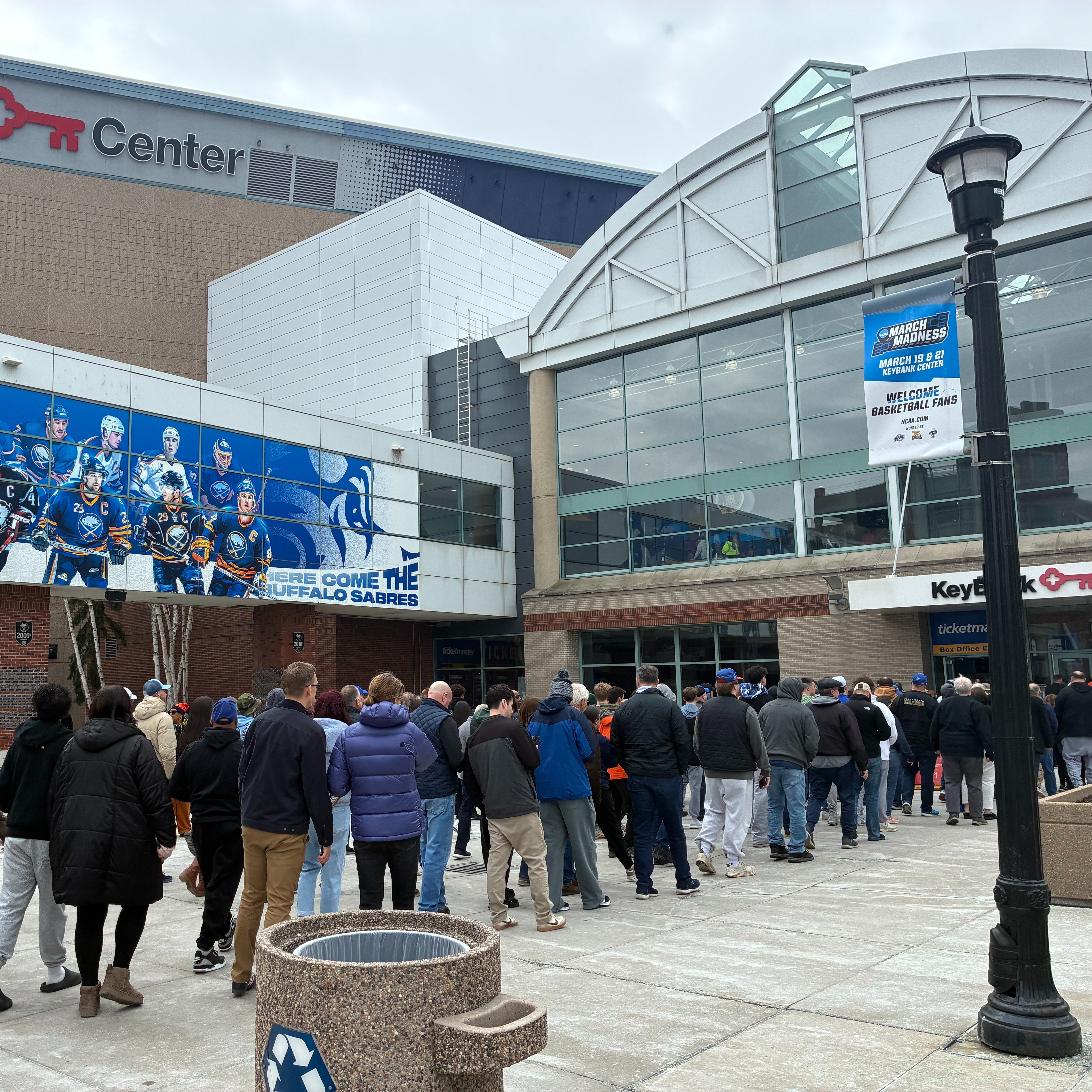 College basketball fans taking in the NCAA men's basketball tournament in Buffalo on Thursday episode artwork