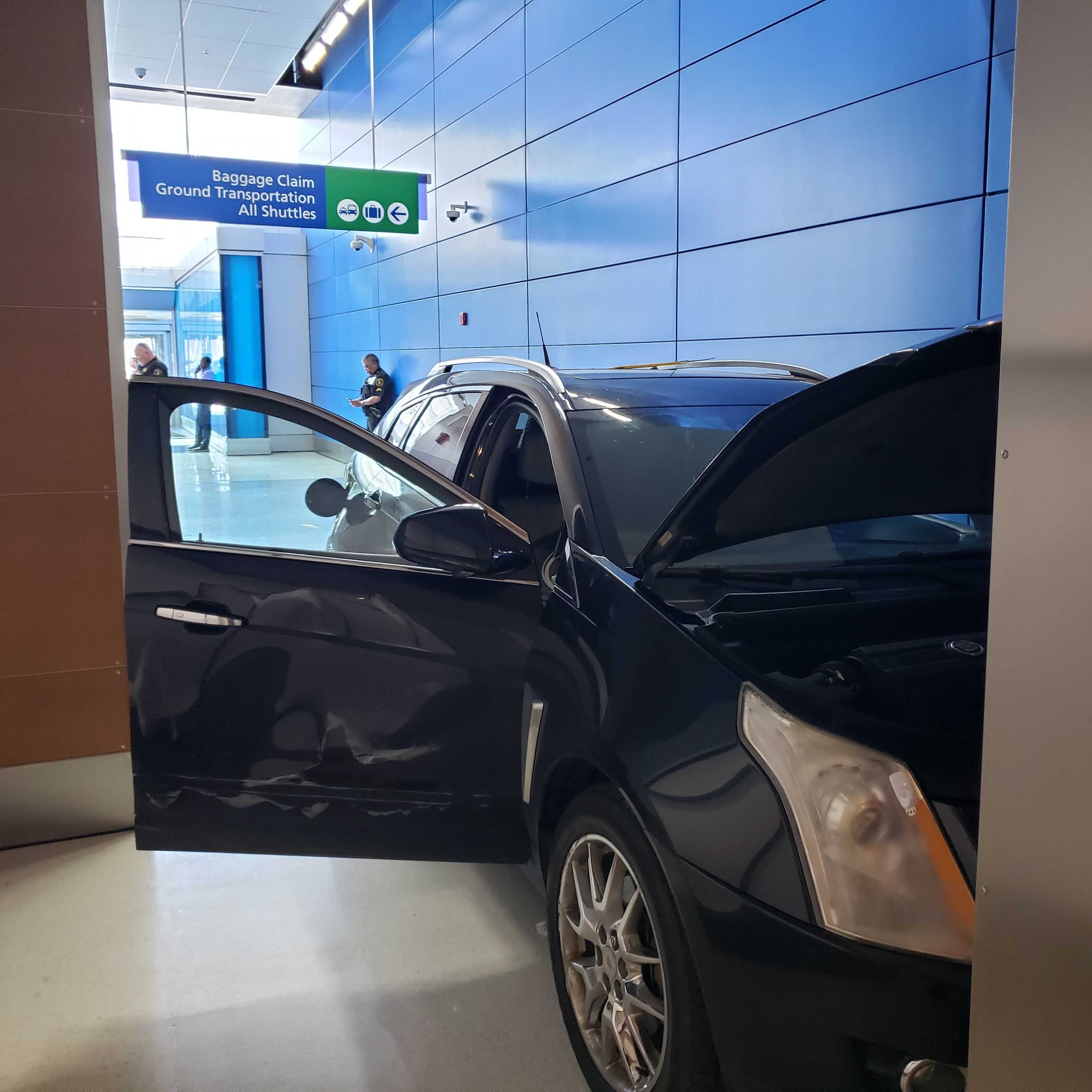 Man drives Cadillac into terminal at Detroit Metro Airport, arrested episode artwork