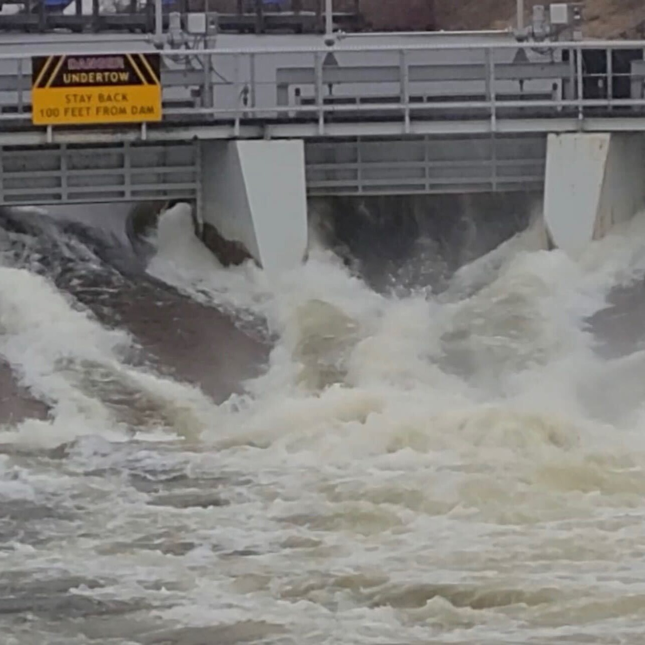Rushing water, floating docks, debris, danger in Cheboygan due to flooding episode artwork