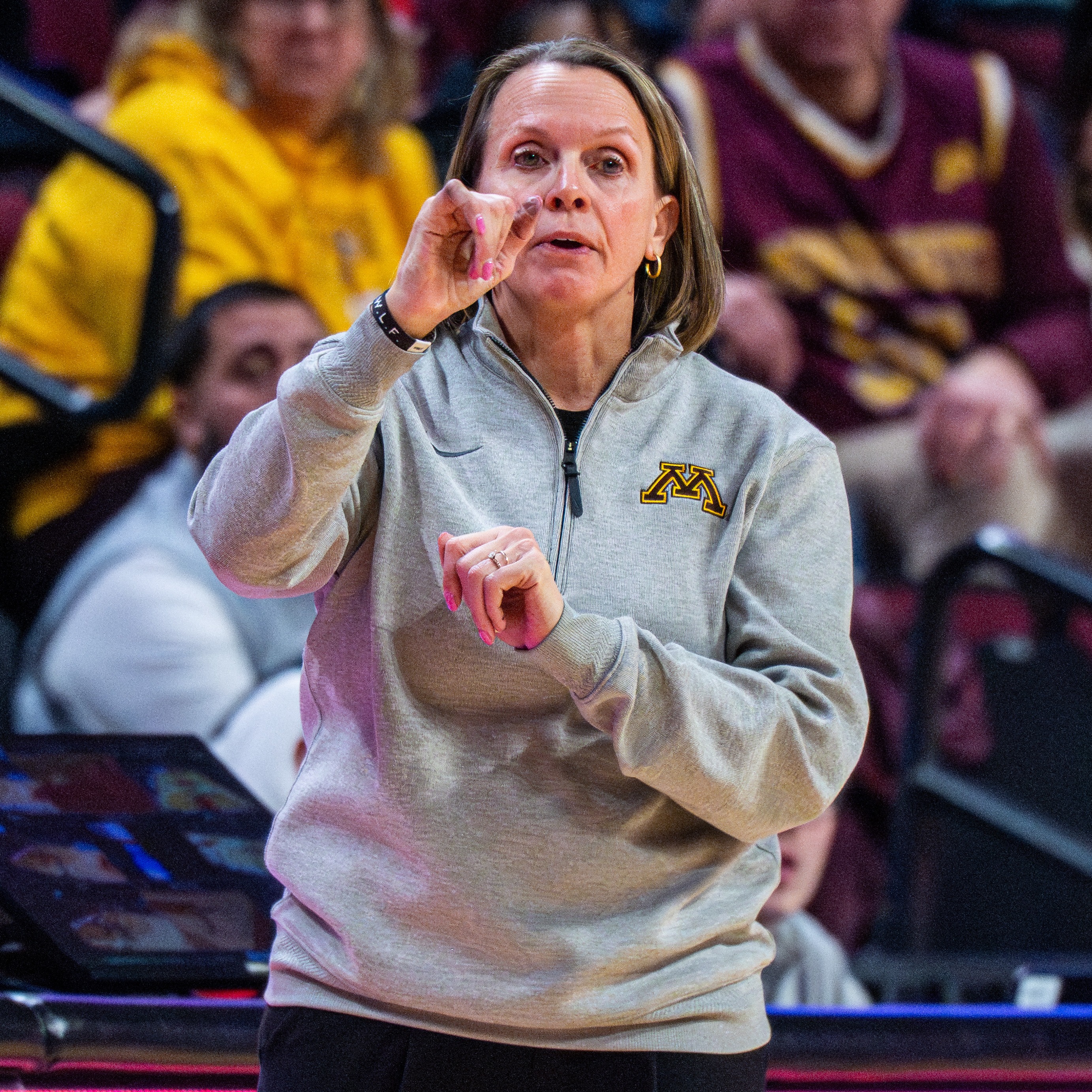 What makes Gopher Women's Basketball Head Coach Dawn Plitzuweit proud of her program? episode artwork