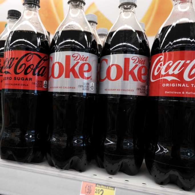 Why is Tracy Perlman addicted to Diet Coke?