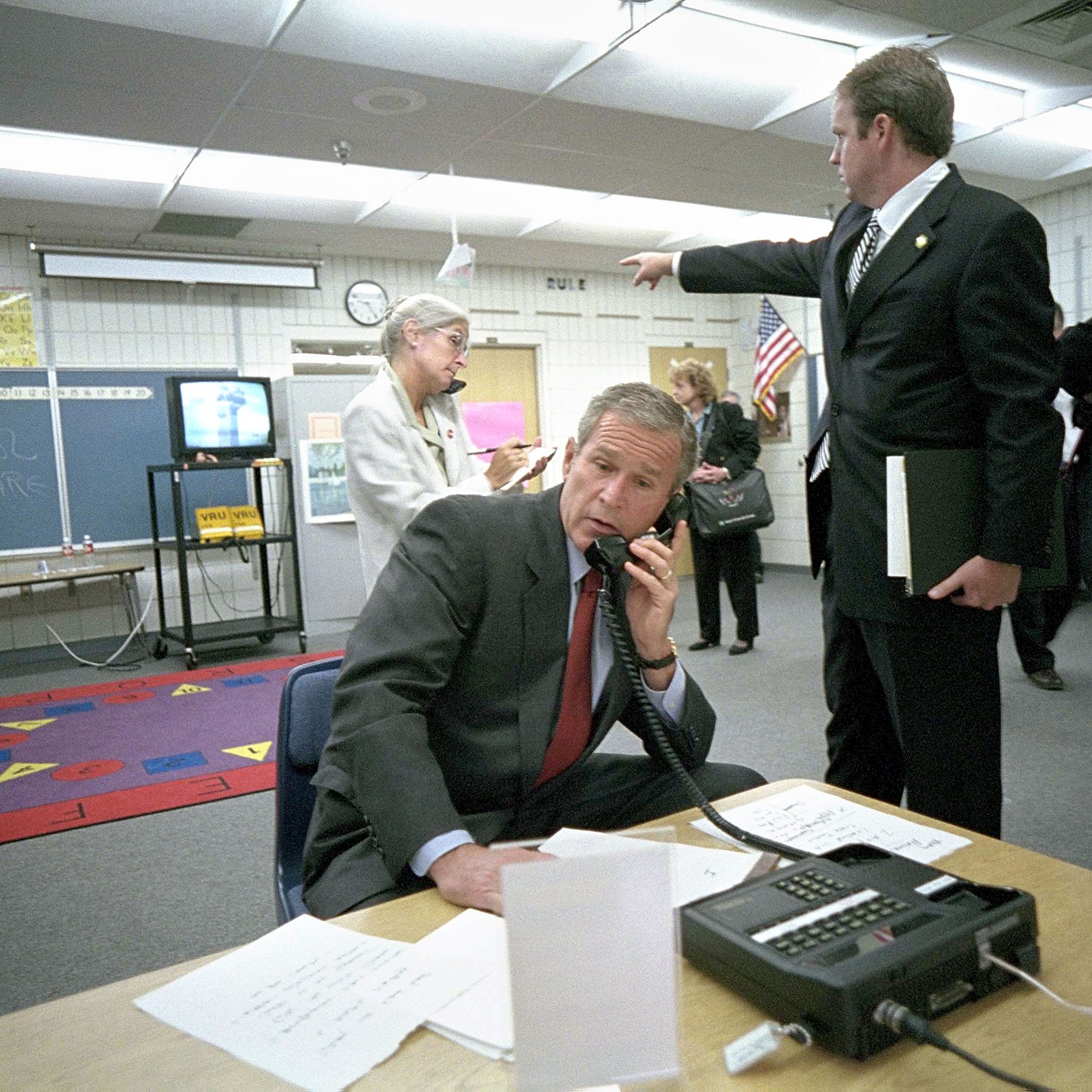 “Mr. President, I am Kia and I’m the one who will be counting you down,” Kia Bakersville on covering 9/11/01 with the White House Press Corps episode artwork
