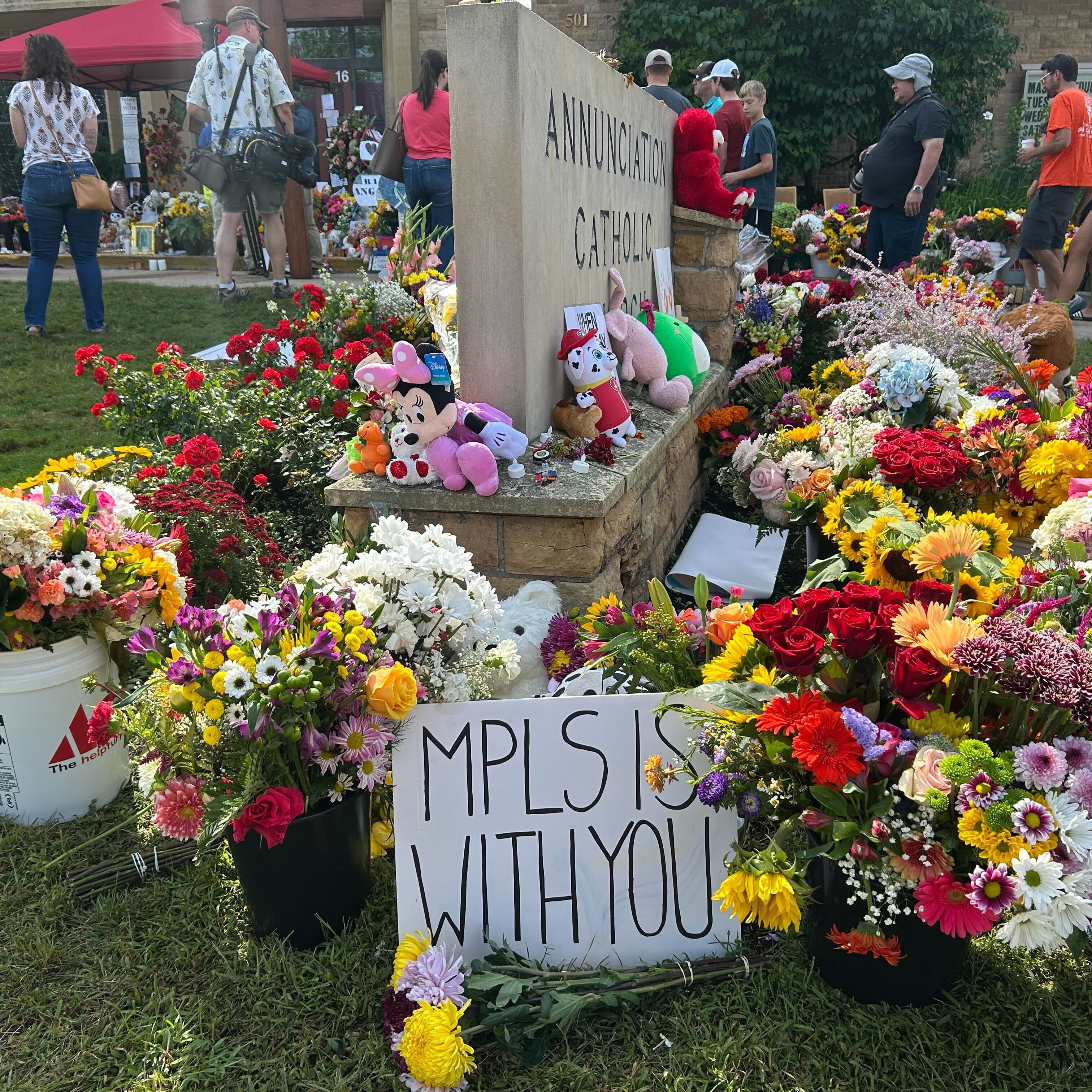 Mourners gather at Annunciation, a father of one of the children killed shares his grief, Gopher coach PJ Fleck says there are things bigger than football wins