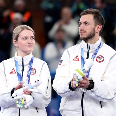 Sloane Martin reacts to the US earning silver in mixed doubles curling
