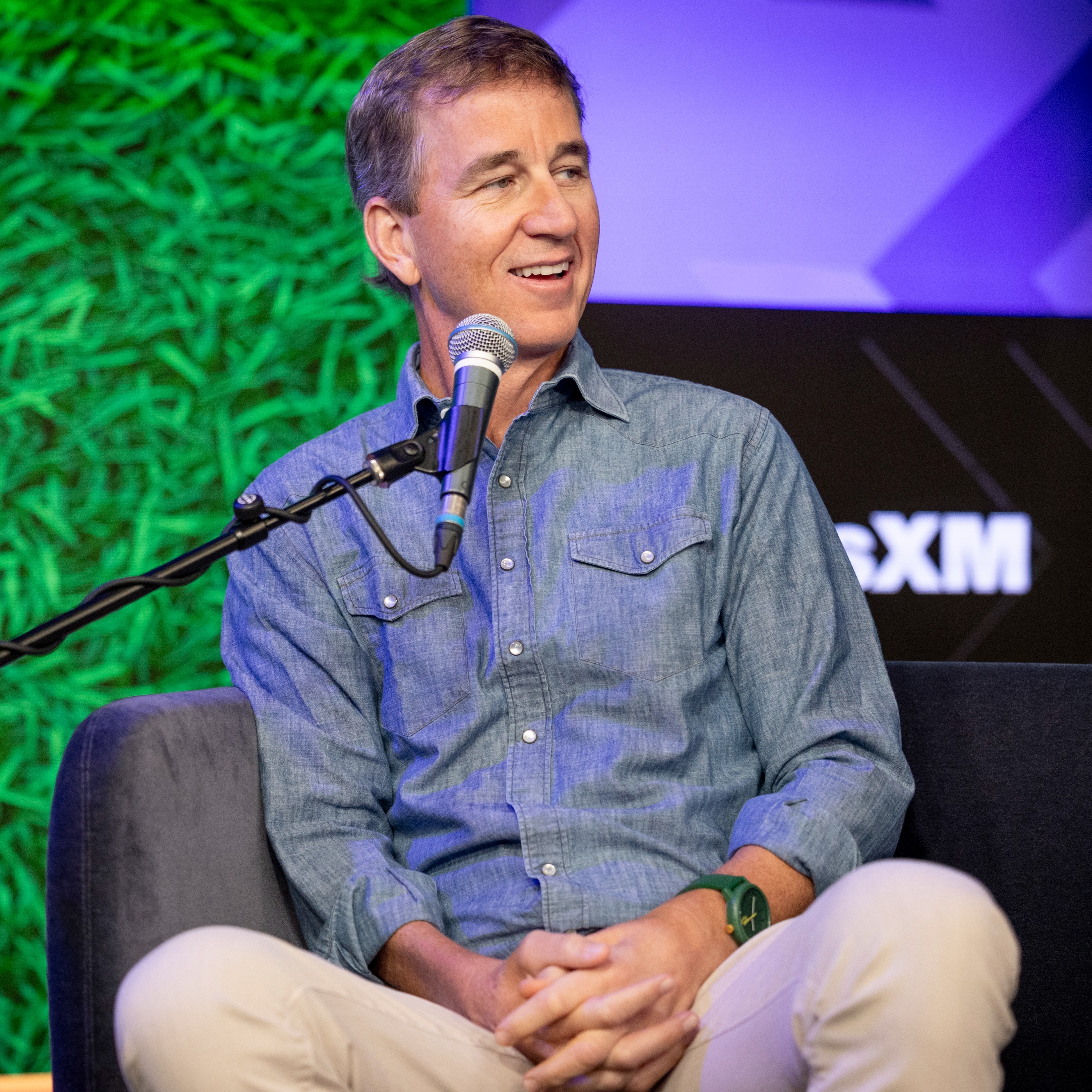 Cooper Manning discusses Manning Passing Academy, his new podcast, and Arch at Texas episode artwork