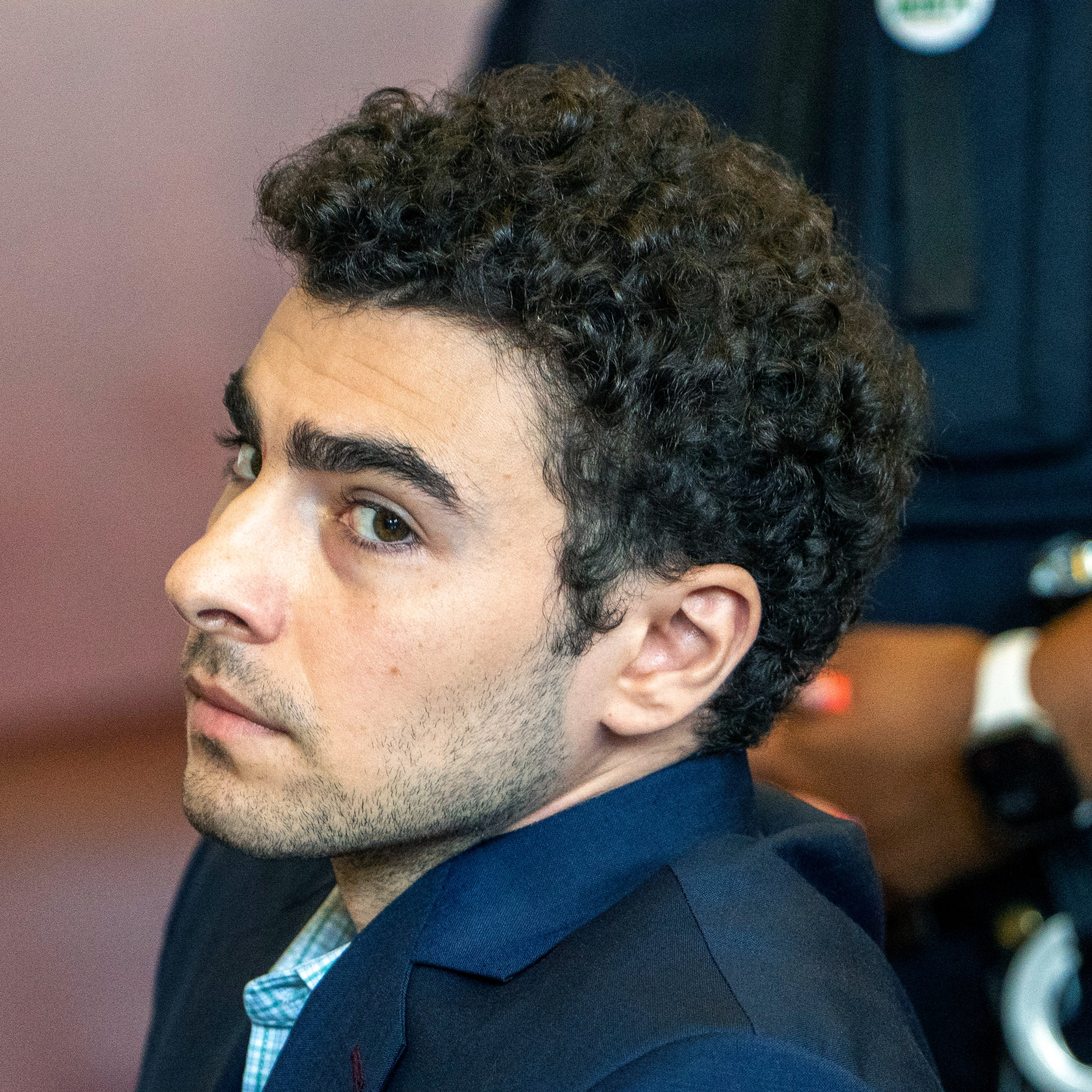 Judge allows gun and notebook as evidence at Mangione’s trial episode artwork