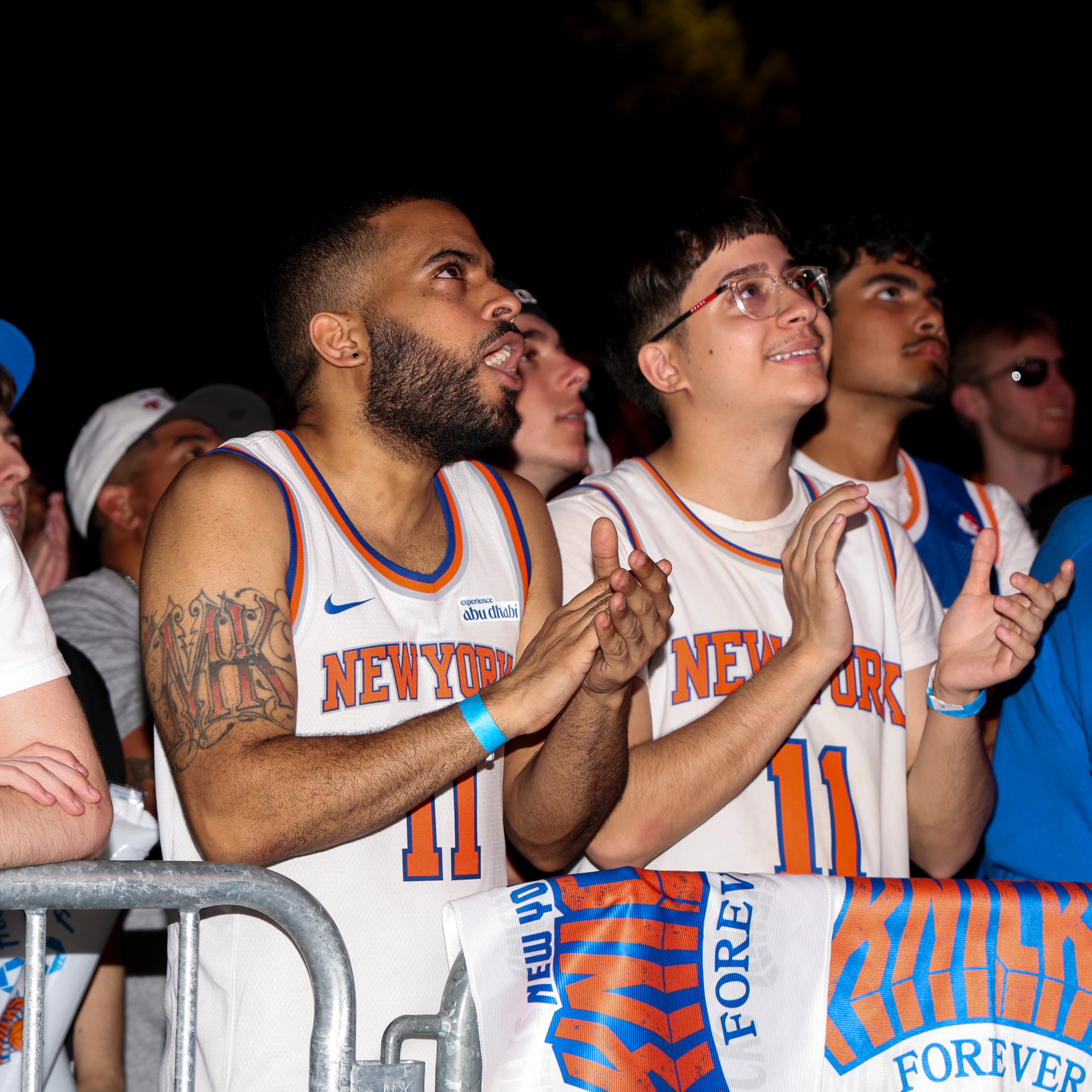 Blue and orange light up NY as fans celebrate a legendary Knicks win episode artwork