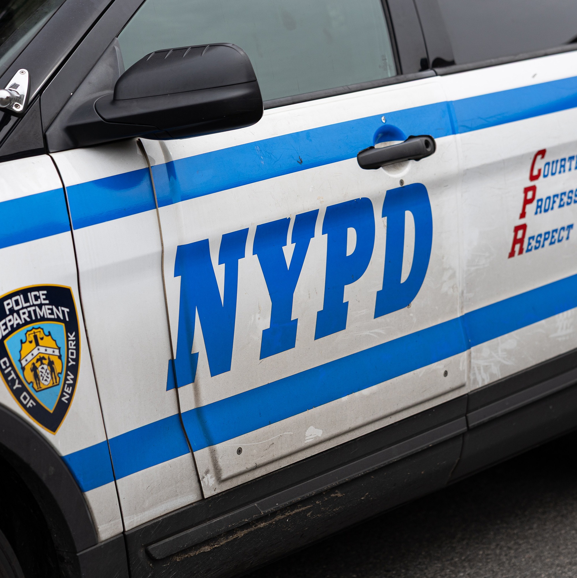 NYPD officer accused of pointing gun at civilian employee episode artwork