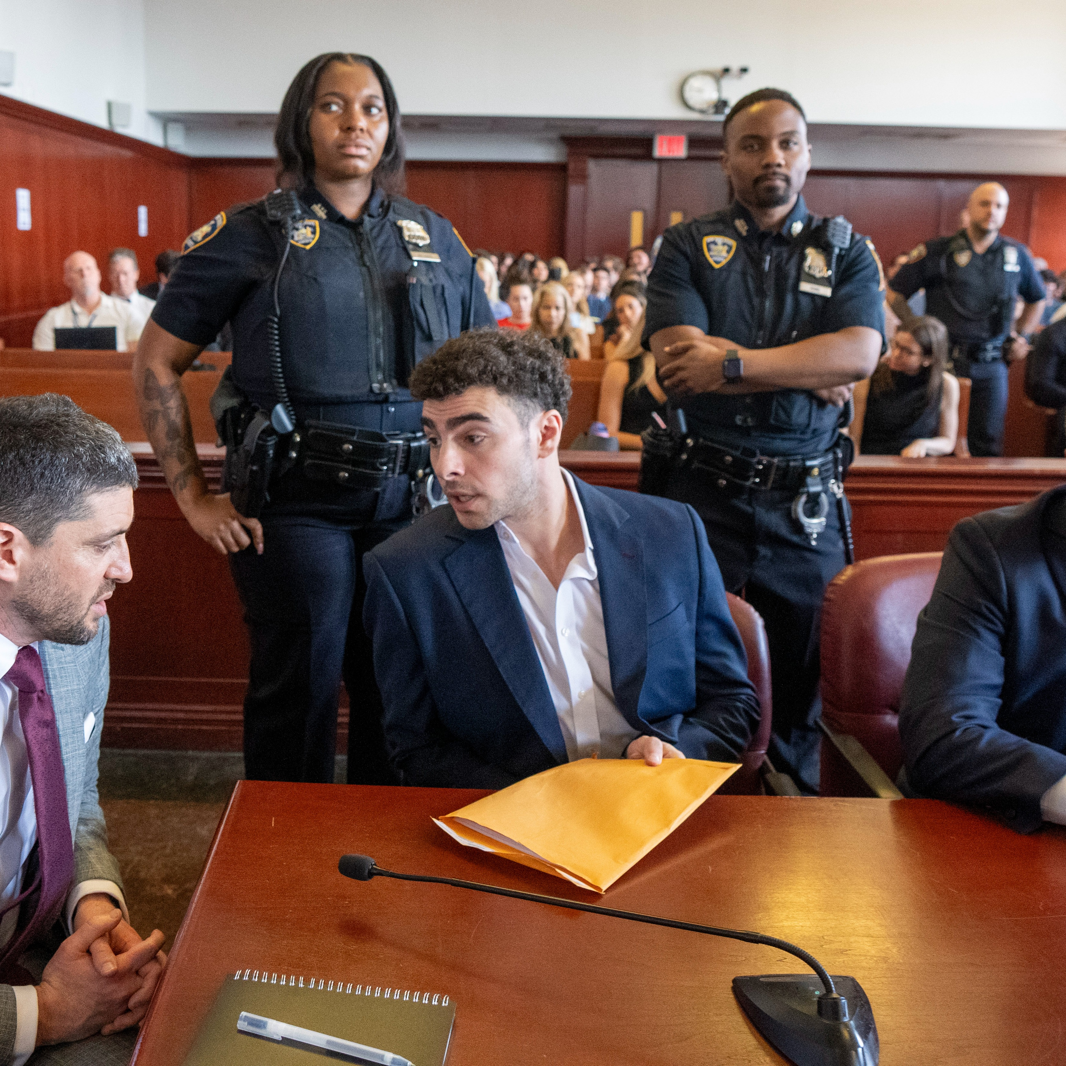 Luigi Mangione in court for pre-trial hearing episode artwork