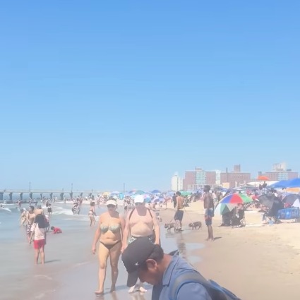 New Yorkers flock to the beach to beat the heat episode artwork