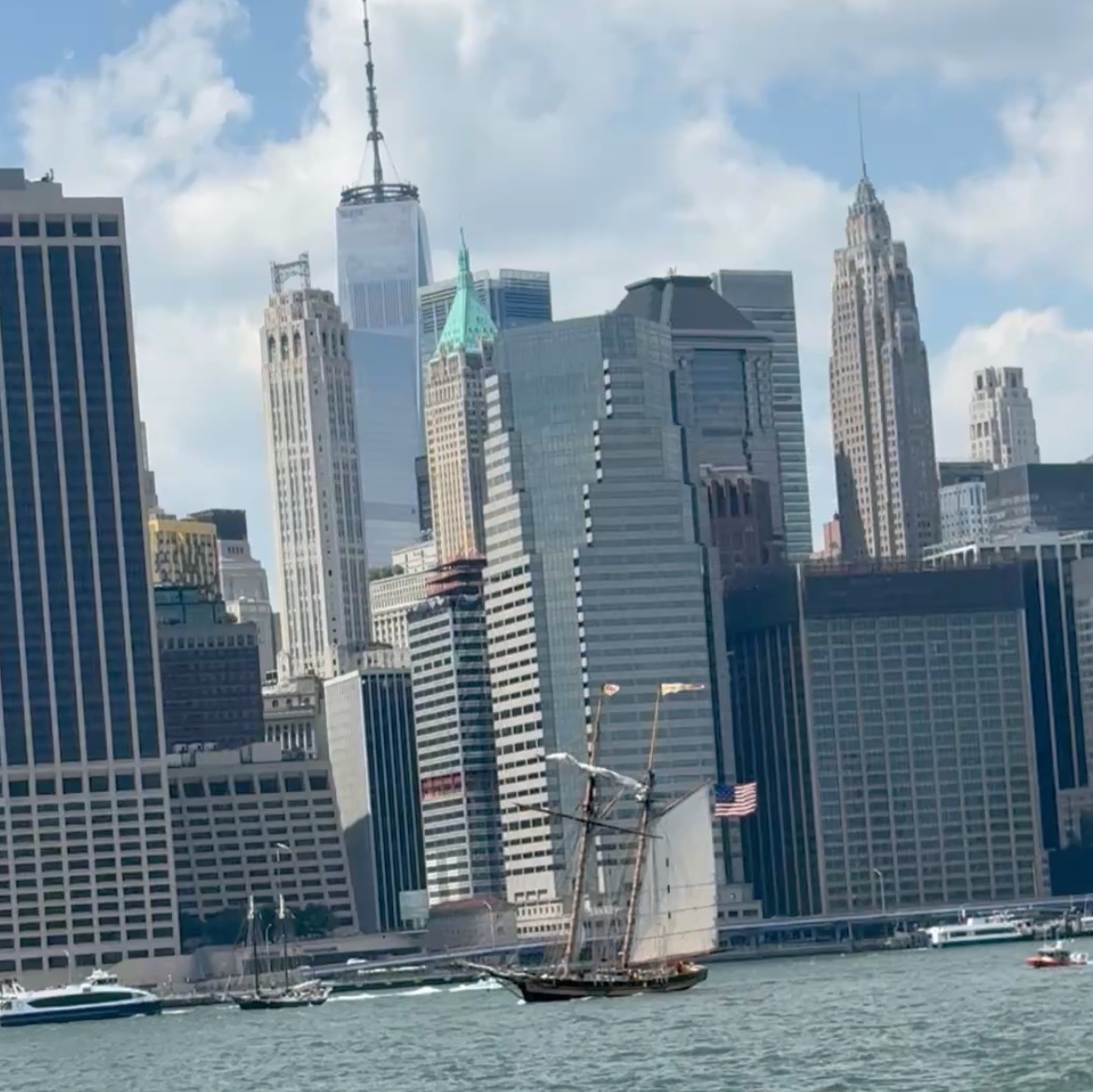 Small ship parade sails down the East River before the Sail4th 250 event episode artwork
