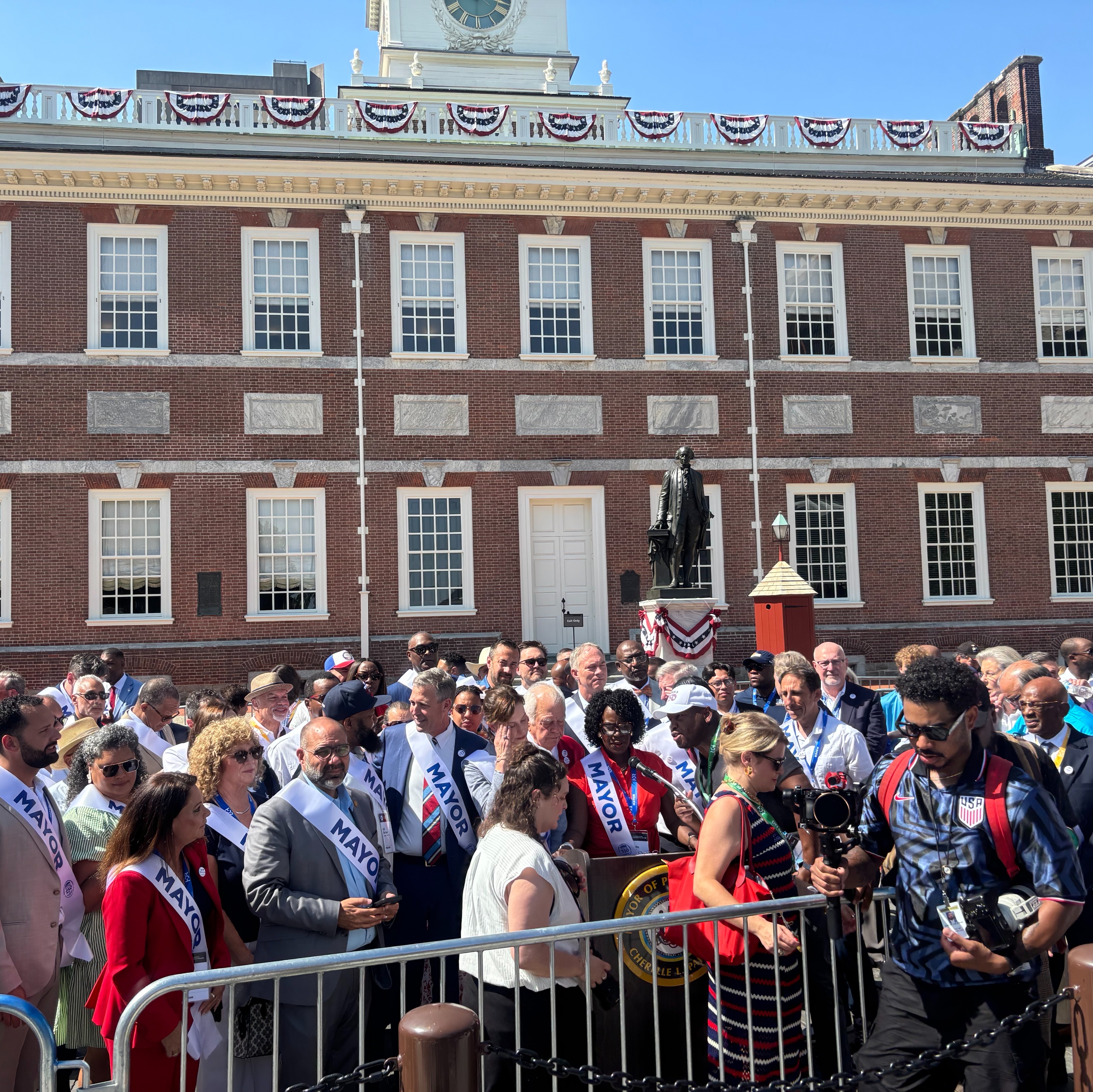 Mayors from around the country march through Philadelphia to mark nation’s 250th episode artwork