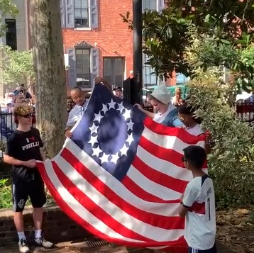 Hundreds brave the heat for flag-raising at Betsy Ross House episode artwork