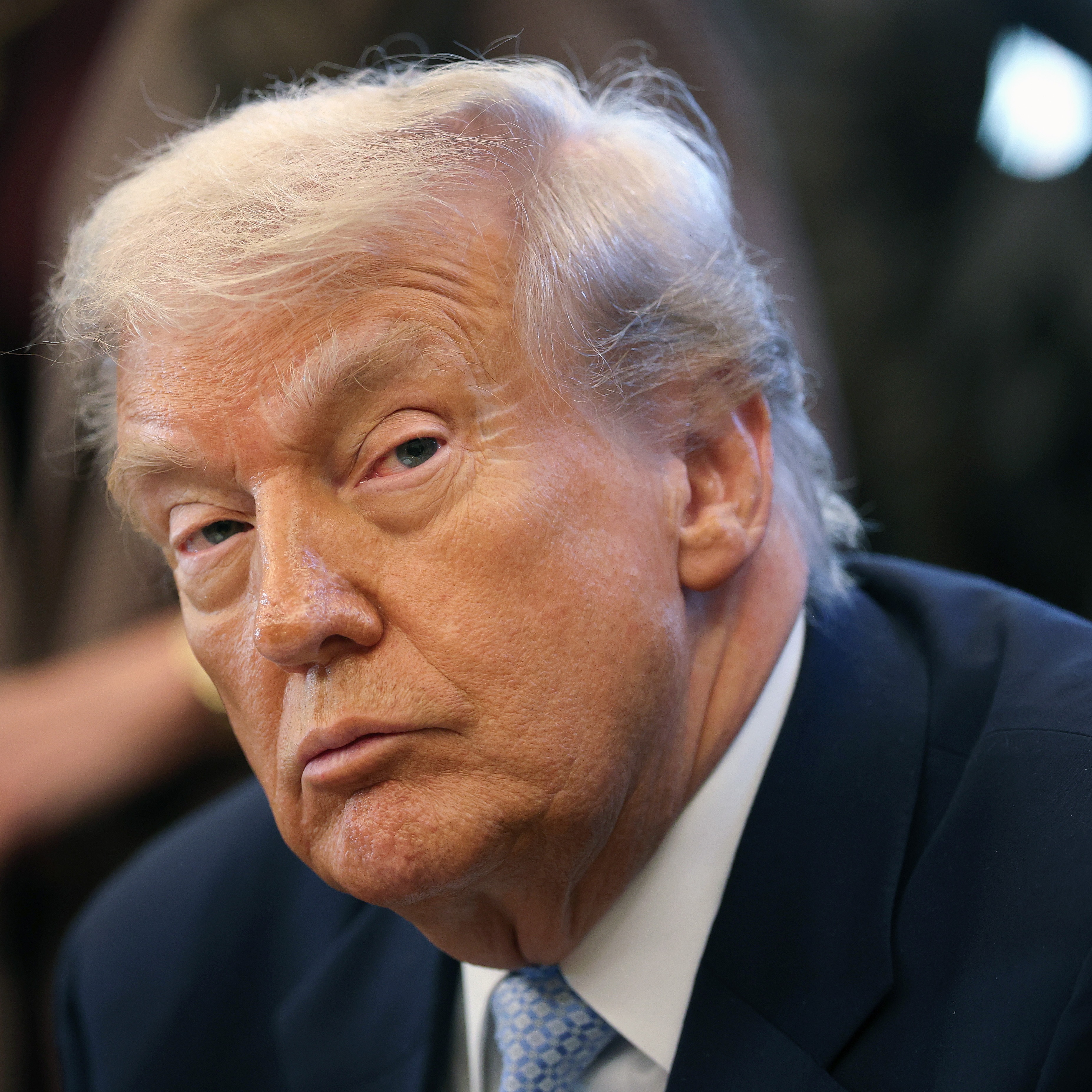 Trump signs to release Epstein files, but information may be withheld