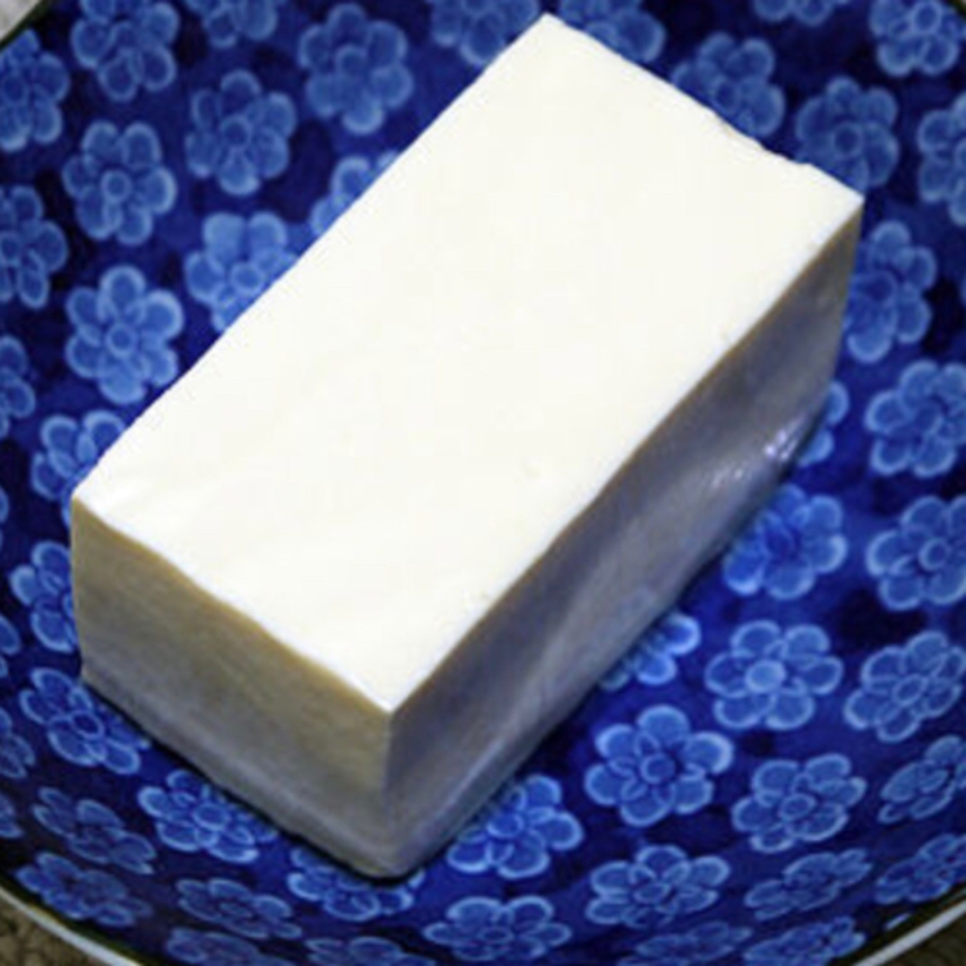 Tofu is also called as Bean Curd, is a food prepared by coagulating soy milk episode artwork