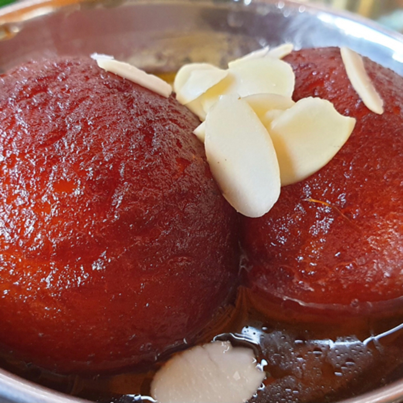 Gulab Jamun is a milk solid base sweet originating in the Indian subcontinent episode artwork