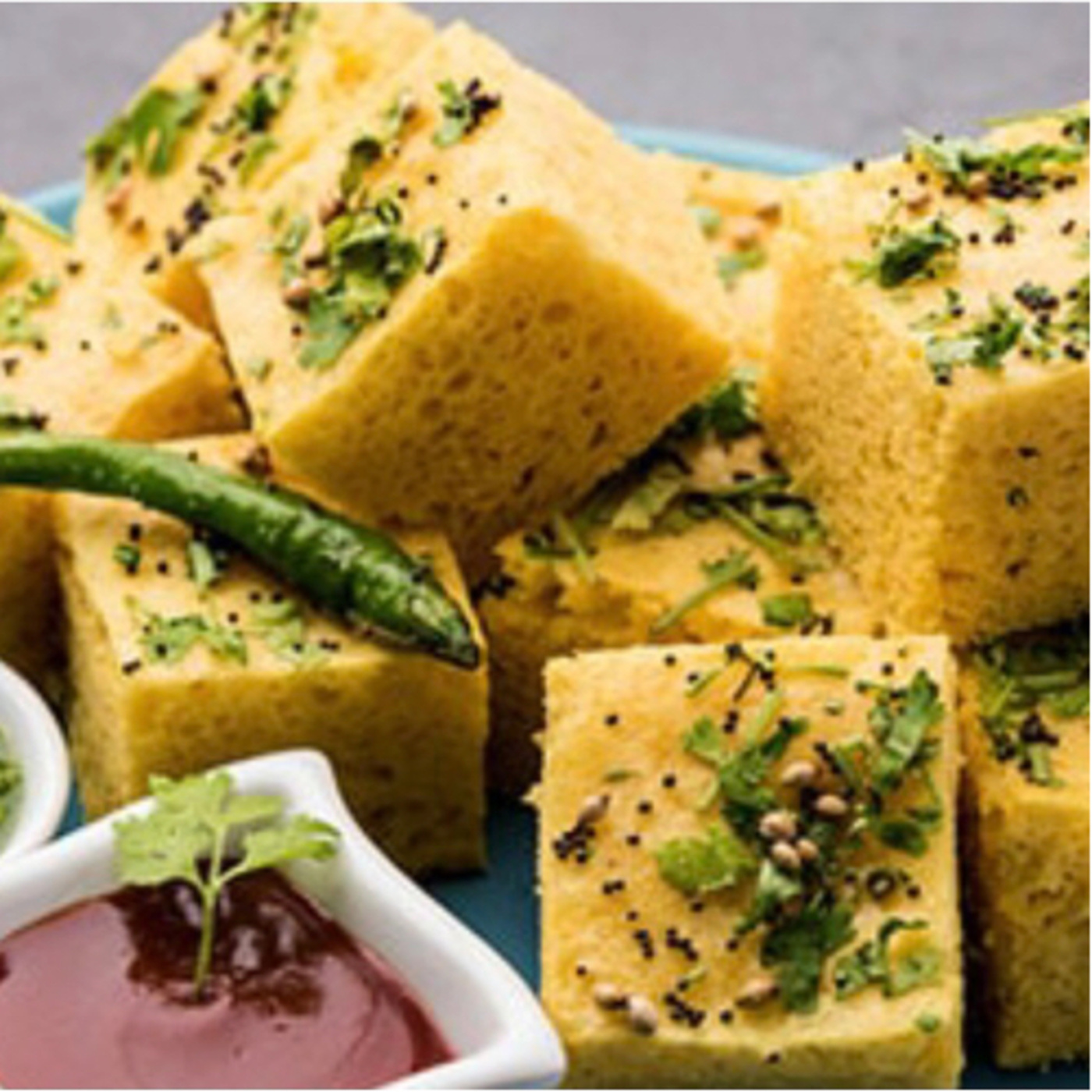 Dhokla is a vegetarian culinary dish that is found mainly in the Indian State of Gujarat. episode artwork