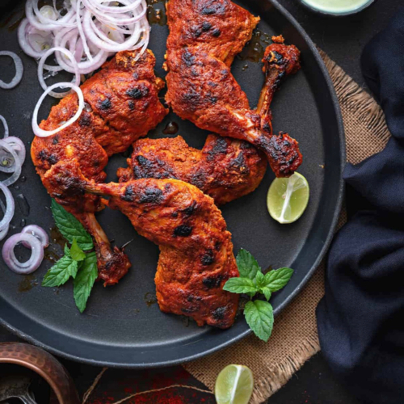 Tandoori Chicken is a Chicken dish prepared by roasting chicken marinated in yogurt and spice episode artwork